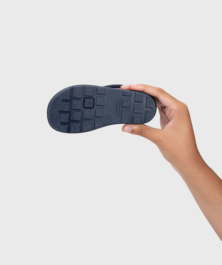 Botas impermeables que respetan los pies de los niños - Igor Yogi Cuello Marino